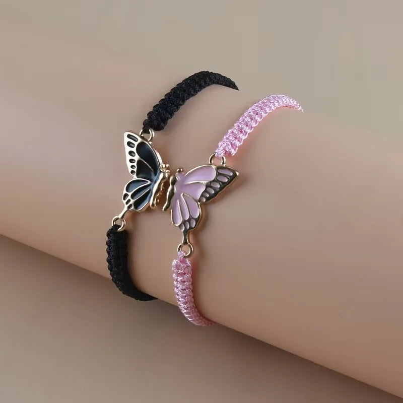 Set mit 2 Schmetterlingsflügel-Armbändern für beste Freunde in Schwarz und Rosa