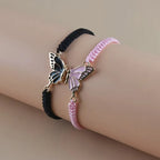 Set mit 2 Schmetterlingsflügel-Armbändern für beste Freunde in Schwarz und Rosa