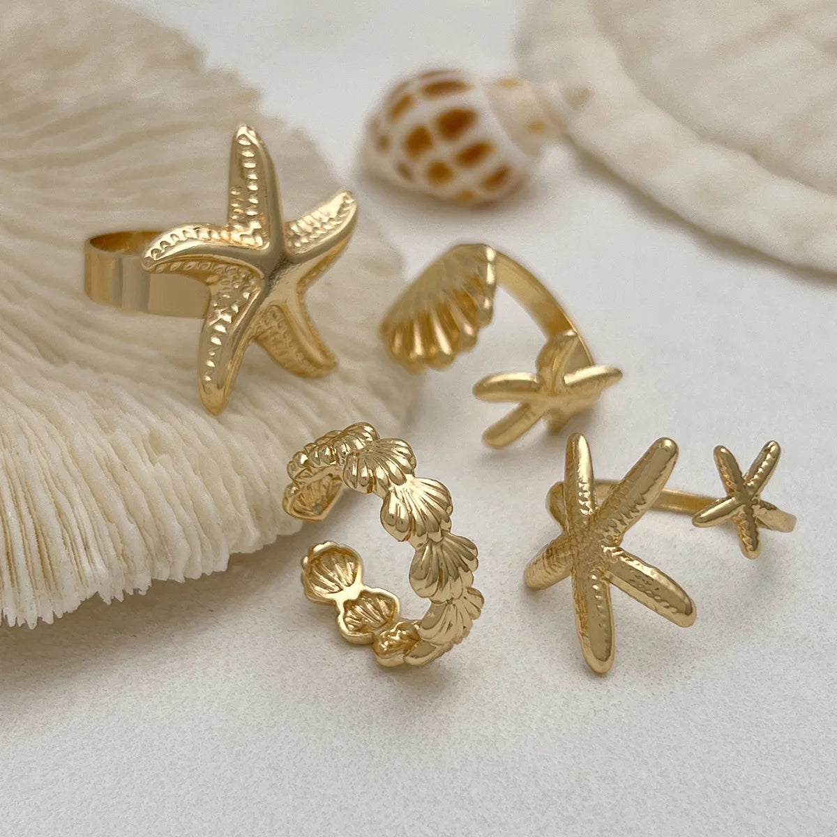 4er-Set Muschel- und Seesterne-Ringe in Gold