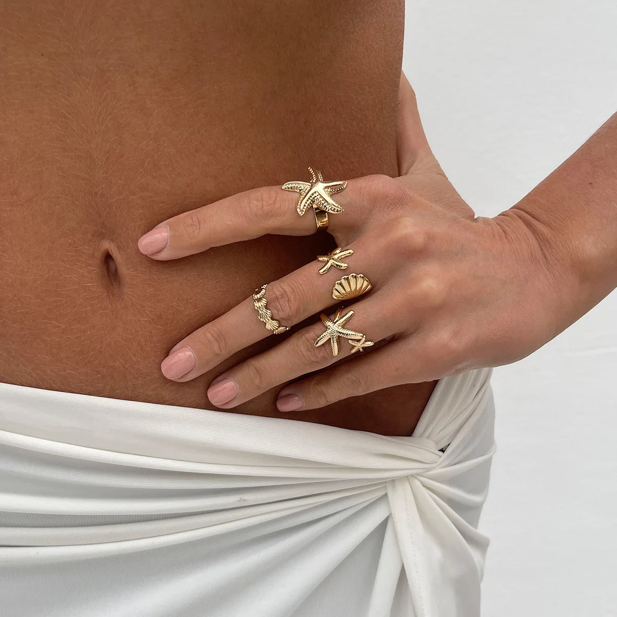 4er-Set Muschel- und Seesterne-Ringe in Gold