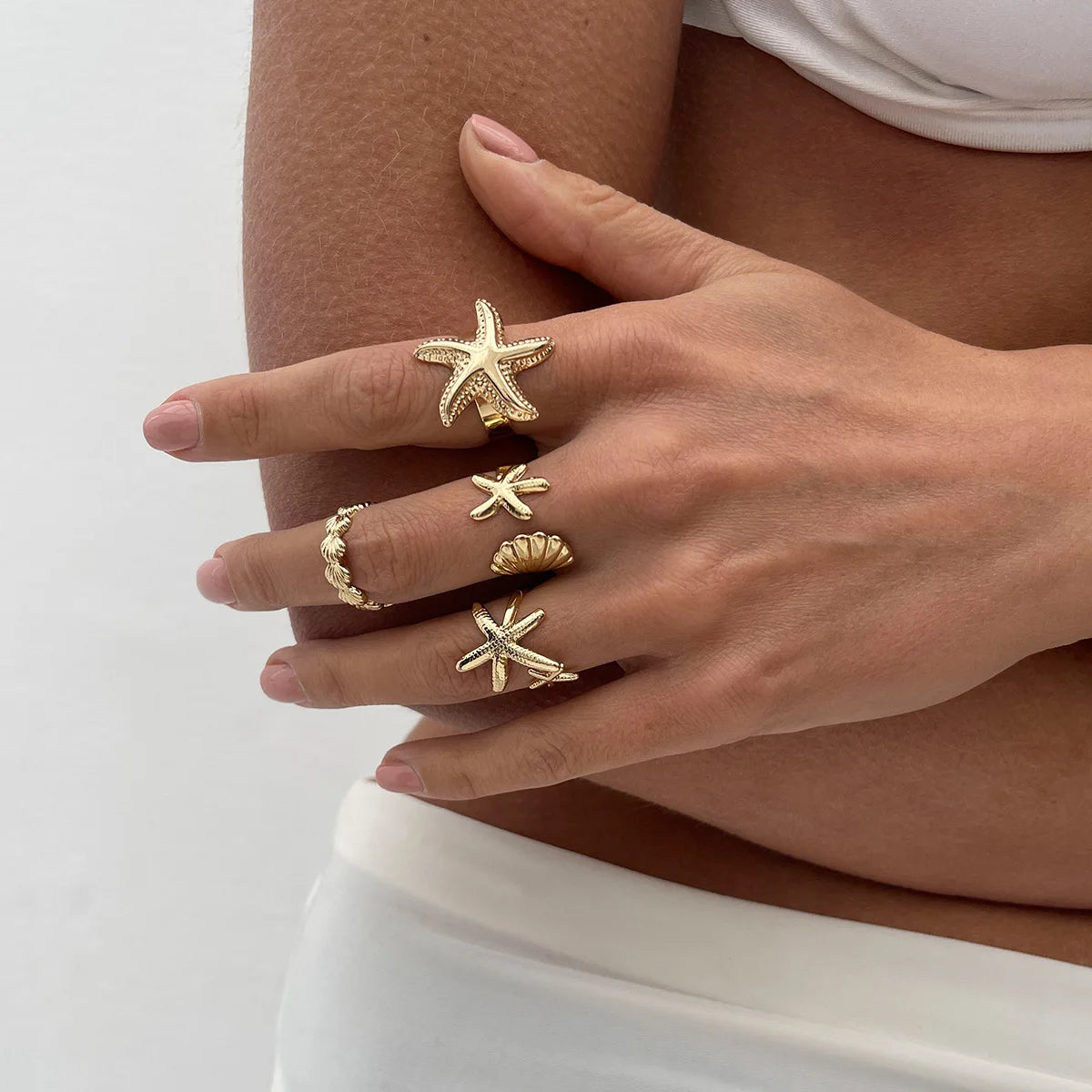 4er-Set Muschel- und Seesterne-Ringe in Gold