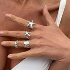 4er-Set Muschel- und Seesterne-Ringe in Silber