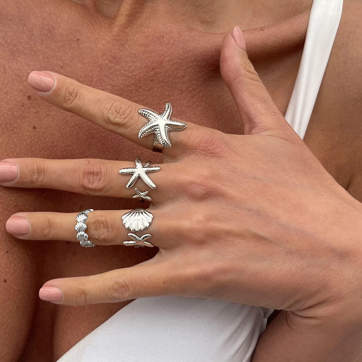 4er-Set Muschel- und Seesterne-Ringe in Silber