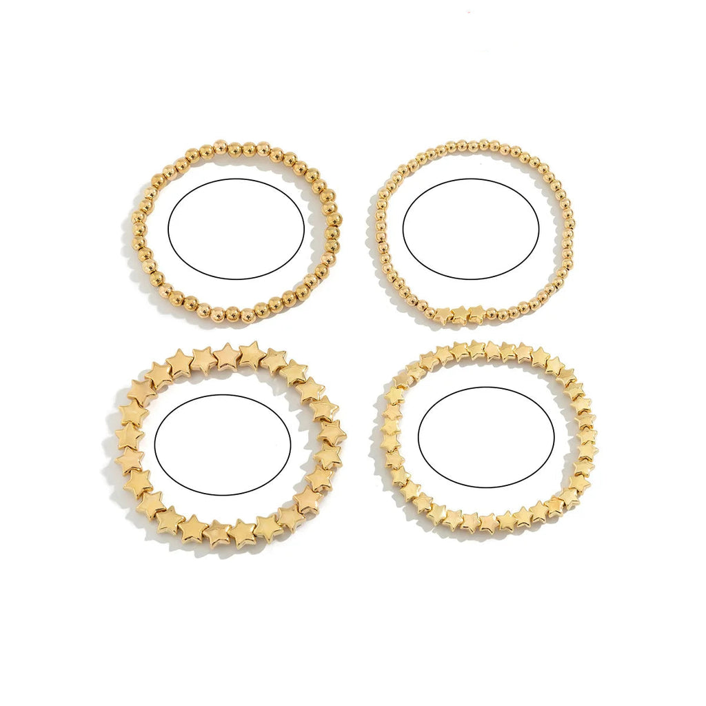 Set mit 4 goldenen Sternarmbändern