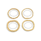 Set mit 4 goldenen Sternarmbändern