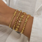 Set mit 4 goldenen Sternarmbändern