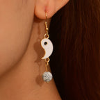 Hängende Yin Yang Ohrringe Gold & Silber gold