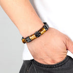 Armband mit Tigerauge-Stein und schwarzem Leder-Gourmette